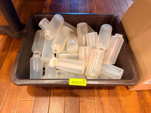 (1) LOT OF ASSORTED PLASTIC SQUEEZE BOTTLES.
