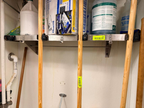 24" STAINLESS WALL SHELF W/ TOOL HOLDER GRIPS.