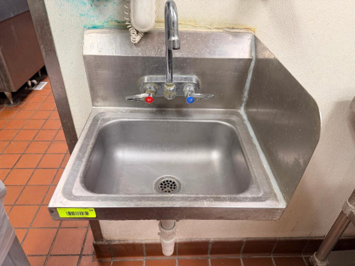 WALL MOUNTED STAINLESS HAND SINK.
