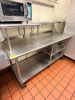60"W X 30"D STAINLESS STEEL WORK / PREP TABLE WITH DOUBLE OVER SHELF AND UNDERSHELF STORAGE. UNIT FEATURES RAISED DOUBLE-TIER SHELVING FOR EQUIPMENT OR STORAGE, LOWER SHELF, AND CASTER - 3