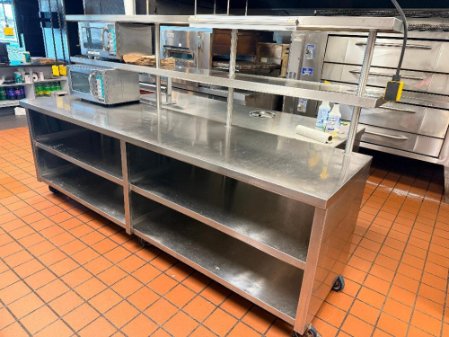 108"W X 30"D STAINLESS STEEL DOUBLE-TIER WORK / PREP TABLE WITH OVER SHELF AND UNDERSHELF STORAGE. UNIT FEATURES HEAVY-DUTY CONSTRUCTION, OPEN BASE SHELVING, AND CASTERS