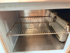 112"W THREE-DOOR PREP TABLE / SANDWICH UNIT WITH RAISED INGREDIENT ICE RAIL AND HINGED LIDS. UNIT FEATURES STAINLESS STEEL CONSTRUCTION, REFRIGERATED BASE STORAGE, AND CUTTING/WORK SURFACE. - 3