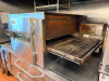 LINCOLN CONVEYOR OVEN WITH FRONT-LOAD DOOR AND EXTENDED CONVEYOR BELT SYSTEM. UNIT FEATURES DIGITAL CONTROL PANEL, VIEWING WINDOW - 5