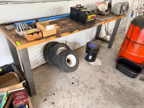 8' X 20" WOODEN FABRICATION TABLE.