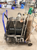 EASTWOOD TIG WELDER PACKAGE MOUNTED ON MOBILE CART WITH GAS CYLINDER, REGULATOR, TORCH, AND LEADS. CONTROL PANEL FEATURES ADJUSTABLE SETTINGS FOR POWER, CLEARANCE EFFECT, PRE FLOW, AND POST FLOW WITH AC/DC SELECTION.