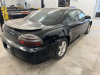 PONTIAC GRAND PRIX GTP WITH AUTOMATIC TRANSMISSION, FACTORY ALLOY WHEELS, AND REAR SPOILER. EQUIPPED WITH 3800 SERIES SUPERCHARGED ENGINE. SHOWS WEAR INCLUDING PAINT FADE, SCRATCHES, AND BODY DAMAGE AS PICTURED. - 12