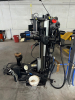 HEAVY DUTY TIRE CHANGER MACHINE WITH INTEGRATED BEAD BREAKER, SWING ARM ASSEMBLY, AND CONTROL PANEL WITH PRESSURE GAUGE. WITH ATTACHED ACCESSORIES AND AIR LINES PRESENT. INDUSTRIAL GRADE CONSTRUCTION WITH ELECTRO-PNEUMATIC OPERATION. - 7