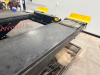 12,000 LB. CAPACITY HEAVY DUTY IN-GROUND SCISSOR VEHICLE LIFT WITH DUAL RUNWAYS AND INTEGRATED CENTER JACK, HYDRAULIC SYSTEM WITH STANDALONE CONTROL COLUMN. WITH DATA PLATES AND SAFETY LABELS PRESENT. SOLID INDUSTRIAL CONSTRUCTION WITH 12,000 LB. MAIN LI - 6