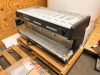 NUOVA SIMONELLI APPIA COMMERCIAL ESPRESSO MACHINE WITH MULTIPLE GROUP HEADS, INTEGRATED CONTROL PANEL, STEAM WANDS, AND DRIP TRAY. STAINLESS STEEL BODY WITH BLACK TRIM AND FACTORY LABELING PRESENT, ACCESSORIES AND COMPONENTS AS SHOWN. - 6