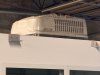 OUTDOOR KIOSK UNIT WITH GLASS SERVICE WINDOWS, INTERIOR CABINETRY, MULTIPLE SINK BASINS, UNDERCOUNTER REFRIGERATION, AND ROOF MOUNTED HVAC UNIT. UNIT FEATURES PAINTED METAL EXTERIOR, ACCESS DOOR, INTERIOR LIGHTING, ELECTRICAL PANEL, AND PLUMBING CONNECTIO - 4