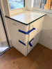 OUTDOOR KIOSK UNIT WITH GLASS SERVICE WINDOWS, INTERIOR CABINETRY, MULTIPLE SINK BASINS, UNDERCOUNTER REFRIGERATION, AND ROOF MOUNTED HVAC UNIT. UNIT FEATURES PAINTED METAL EXTERIOR, ACCESS DOOR, INTERIOR LIGHTING, ELECTRICAL PANEL, AND PLUMBING CONNECTIO - 6