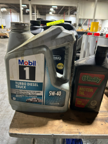 ASSORTED LOT OF OIL