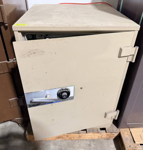 FIRE-RATED SAFE WITH MECHANICAL COMBINATION LOCK AND HEAVY-DUTY STEEL CONSTRUCTION. FEATURES INTERNAL LOCKING BOLTS AND INSULATED BODY FOR FIRE PROTECTION.