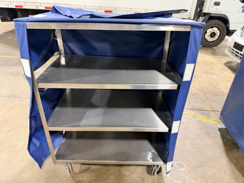 36" X 24" FOUR TIER STAINLESS UTILITY CART W/ VINYL COVER.
