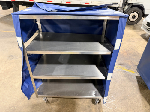 36" X 24" FOUR TIER STAINLESS UTILITY CART W/ VINYL COVER.