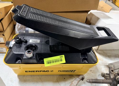 ENERPAC TURBO II AIR HYDRAULIC FOOT PUMP. UNIT FEATURES FOOT OPERATED CONTROL FOR HANDS FREE OPERATION AND PORTABLE RESERVOIR DESIGN.