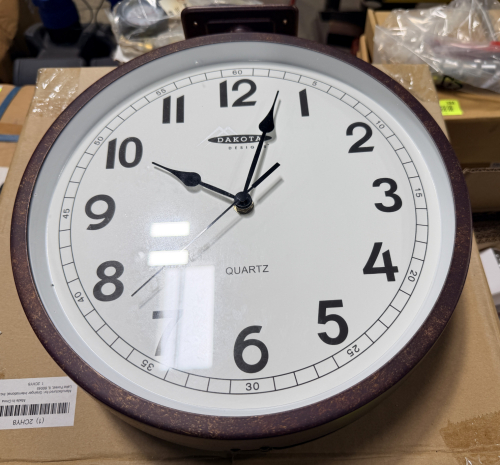 (2) DAKOTA DESIGNS WALL CLOCK WITH QUARTZ MOVEMENT AND LARGE EASY-TO-READ FACE.