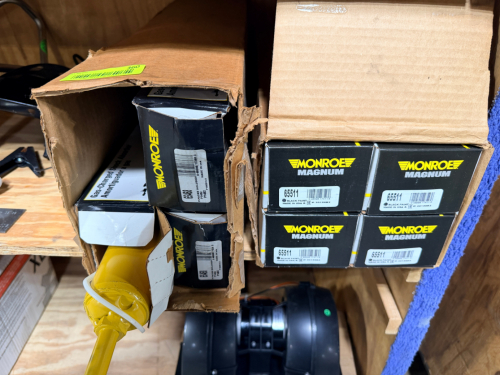 MULTIPLE NEW SHOCK ABSORBERS IN BOXES, MIXED PART NUMBERS, AUTOMOTIVE SUSPENSION COMPONENTS.