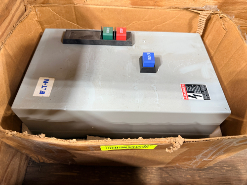 EATON ENCLOSED MOTOR STARTER WITH START/STOP AND RESET PUSHBUTTONS.