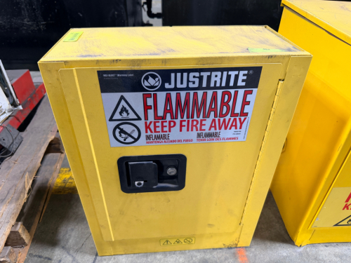 JUSTRITE SURE-GRIP EX FLAMMABLE LIQUID STORAGE CABINET WITH SINGLE DOOR AND LOCKING HANDLE. UNIT FEATURES STEEL CONSTRUCTION WITH INTERIOR SHELF AND SAFETY LABELING.