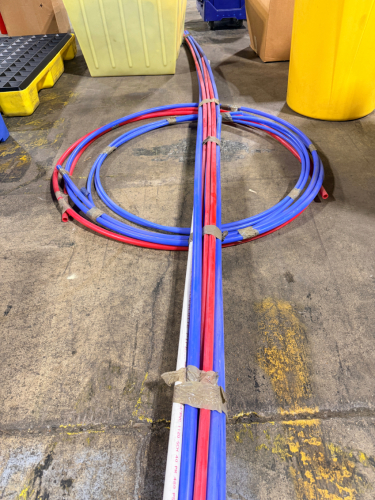 (1) LOT OF RED AND BLUE PLASTIC WATER LINES