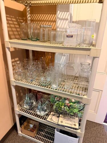 CONTENTS OF SHELF - ASSORTED GLASS VASES AND CENTER PIECES.