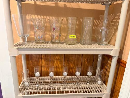 CONTENTS OF SHELF - ASSORTED GLASS VASES AND CENTER PIECES.