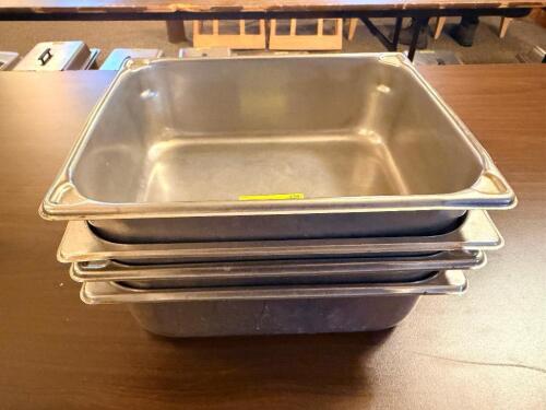(4) HALF SIZE STAINLESS INSERTS.