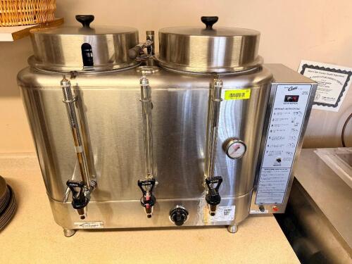 WILBUR CURTIS COMMERCIAL DUAL HEAD COFFEE URN WITH BUILT-IN BREW SYSTEM AND MULTIPLE DISPENSING SPOUTS. INCLUDES LIDS, INTERNAL BASKETS, CONTROL PANEL, AND GAUGE.