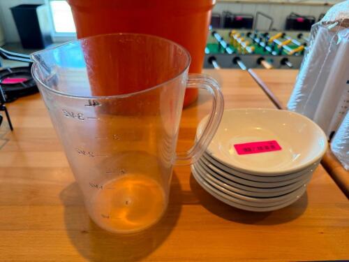 PLASTIC MEASURING PITCHER AND (6) ASSORTED PLATES