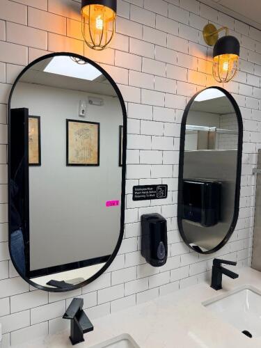 (2) OVAL VANITY MIRRORS W/ BLACK FRAMES