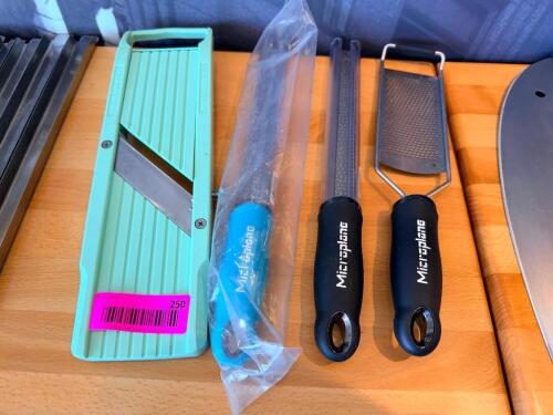 (2) ZESTERS, (1) SHARPENER, AND (1) SLICER.