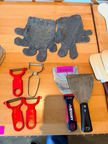 (2) SCRAPERS, (1) LOT OF CHAIN GLOVES, (4) POTATO PEELERS