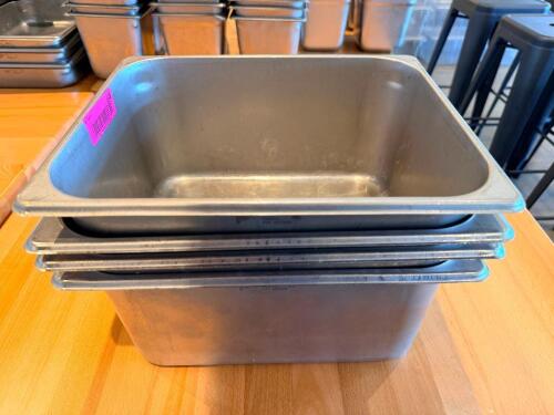 (4) HALF SIZE STAINLESS INSERTS.