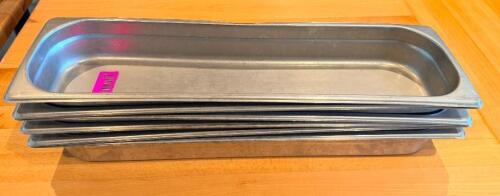 (4)1/2 SIZE LONG STAINLESS INSERTS.