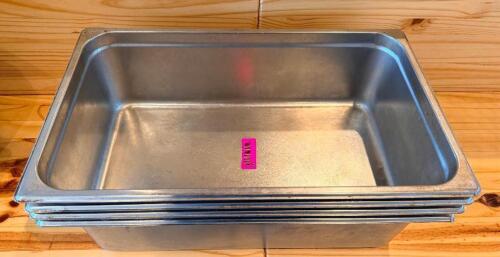(4) FULL SIZE STAINLESS INSERTS.