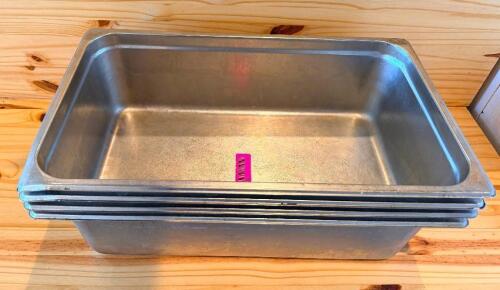 (4) FULL SIZE STAINLESS INSERTS.