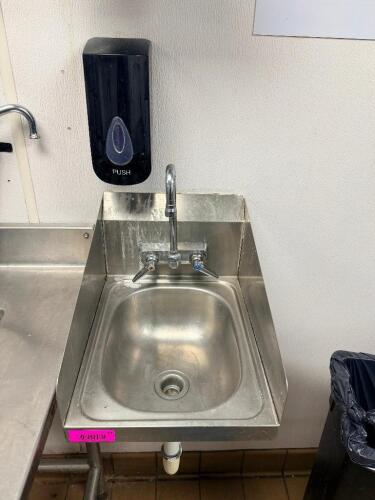 WALL MOUNT STAINLESS STEEL HAND SINK WITH INTEGRATED SIDE SPLASH GUARDS, GOOSENECK FAUCET, AND DUAL CONTROL HANDLES.