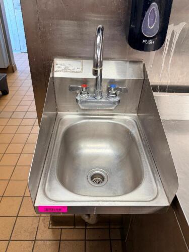 WALL MOUNT STAINLESS STEEL HAND SINK WITH INTEGRATED SIDE SPLASH GUARDS, GOOSENECK FAUCET, AND DUAL CONTROL HANDLES.