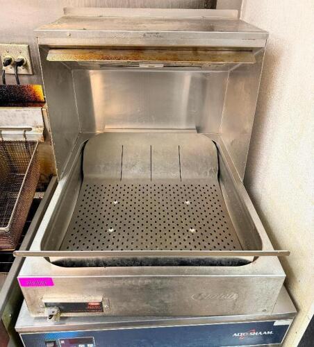 HATCO GLO-RAY FRY HOLDING STATION WITH STAINLESS STEEL BODY, OVERHEAD HEATING ELEMENT, AND PERFORATED HOLDING PAN WITH GREASE DRAIN AREA. FEATURES FRONT MOUNTED POWER SWITCH.