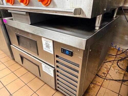 TRUE REFRIGERATION TWO-DRAWER CHEF BASE REFRIGERATOR. STAINLESS STEEL CONSTRUCTION WITH DIGITAL TEMPERATURE DISPLAY AND SELF-CONTAINED REFRIGERATION SYSTEM.