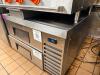TRUE REFRIGERATION TWO-DRAWER CHEF BASE REFRIGERATOR. STAINLESS STEEL CONSTRUCTION WITH DIGITAL TEMPERATURE DISPLAY AND SELF-CONTAINED REFRIGERATION SYSTEM.