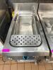 DESCO SINGLE WELL GAS PASTA COOKER WITH STAINLESS STEEL CONSTRUCTION, INTEGRATED WATER FILL FAUCET, AND BASKET INSERT. UNIT FEATURES FRONT CONTROL KNOB AND LOWER ACCESS PANEL WITH INTERNAL GAS COMPONENTS. - 2