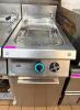 DESCO SINGLE WELL GAS PASTA COOKER WITH STAINLESS STEEL CONSTRUCTION, INTEGRATED WATER FILL FAUCET, AND BASKET INSERT. UNIT FEATURES FRONT CONTROL KNOB AND LOWER ACCESS PANEL WITH INTERNAL GAS COMPONENTS. - 2