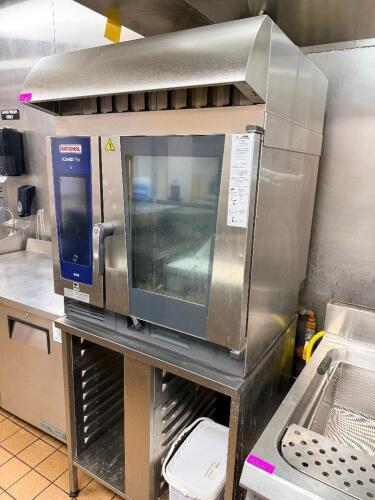 RATIONAL ICOMBI PRO COMMERCIAL COMBI OVEN WITH STAINLESS STEEL CONSTRUCTION, DIGITAL TOUCHSCREEN CONTROL, AND GLASS VIEWING DOOR. UNIT INCLUDES OVERHEAD VENT HOOD AND STAINLESS STEEL STAND WITH PAN RACK STORAGE.