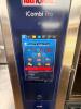 RATIONAL ICOMBI PRO COMMERCIAL COMBI OVEN WITH STAINLESS STEEL CONSTRUCTION, DIGITAL TOUCHSCREEN CONTROL, AND GLASS VIEWING DOOR. UNIT INCLUDES OVERHEAD VENT HOOD AND STAINLESS STEEL STAND WITH PAN RACK STORAGE. - 5
