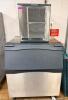 SCOTSMAN MODULAR ICE MACHINE HEAD WITH MATCHING ICE STORAGE BIN IN STAINLESS STEEL CONSTRUCTION. UNIT FEATURES FRONT VENTILATION PANELS AND INTEGRATED CONTROL DISPLAY WITH ICE BIN BELOW. NUGGETS