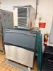 SCOTSMAN MODULAR ICE MACHINE HEAD WITH MATCHING ICE STORAGE BIN IN STAINLESS STEEL CONSTRUCTION. UNIT FEATURES FRONT VENTILATION PANELS AND INTEGRATED CONTROL DISPLAY WITH ICE BIN BELOW. NUGGETS - 2
