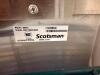 SCOTSMAN MODULAR ICE MACHINE HEAD WITH MATCHING ICE STORAGE BIN IN STAINLESS STEEL CONSTRUCTION. UNIT FEATURES FRONT VENTILATION PANELS AND INTEGRATED CONTROL DISPLAY WITH ICE BIN BELOW. NUGGETS - 5