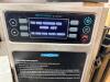 TURBOCHEF DOUBLE STACK COMMERCIAL ELECTRIC CONVEYOR OVENS WITH STAINLESS STEEL CONSTRUCTION AND DIGITAL CONTROL INTERFACE. INCLUDES DUAL CONVEYOR CHAMBERS MOUNTED ON MOBILE STAND WITH CASTERS. - 6